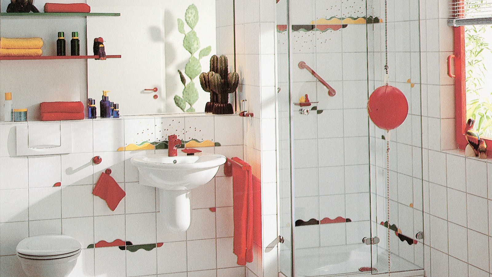 A bathroom like this with a separate shower and playful colour accents in the tiles was very fashionable